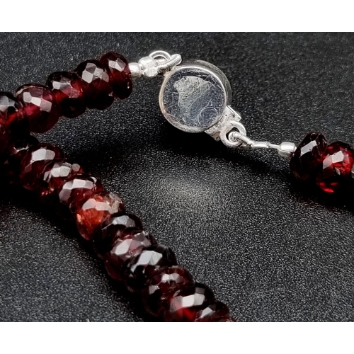 480 - 200ct Faceted Garnet Gemstone Single Strand necklace with an Emerald Clasp in 925 Silver. 42cm.