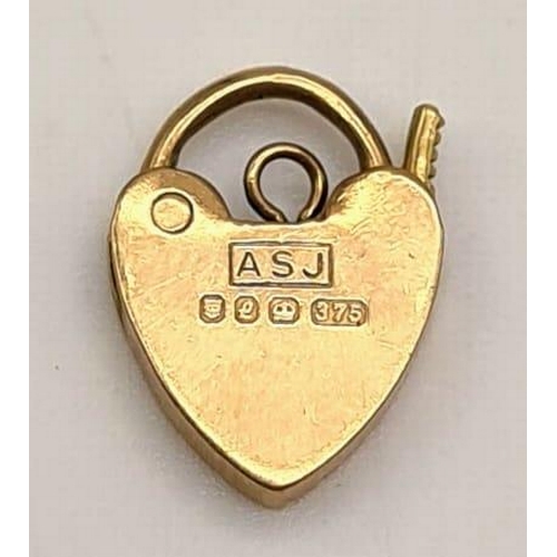 565 - 9K YELLOW GOLD HEART PADLOCK 0.7G