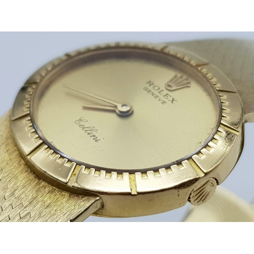 684 - An 18 k yellow gold ROLEX CELLINI ladies watch. Oval dial (25 x 22 mm) with gold bezel, face and han... 