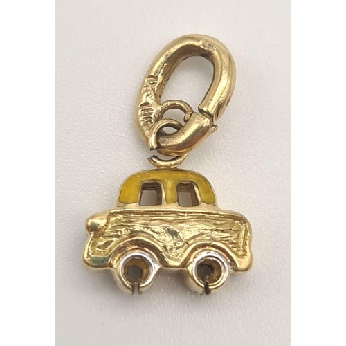 877 - 18K YELLOW GOLD ENAMELLED CAR CHARM DC 2.4G