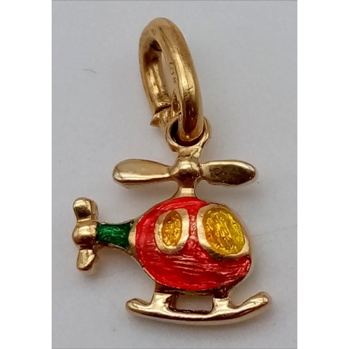 779 - 18K YELLOW GOLD G ENAMELLED HELICOPTER CHARM DC 2.4G.