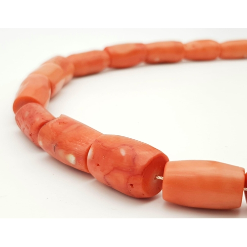 17 - A Vintage Natural Red Coral Barrel Beaded Necklace. A wonderful example piece of coral in its natura... 