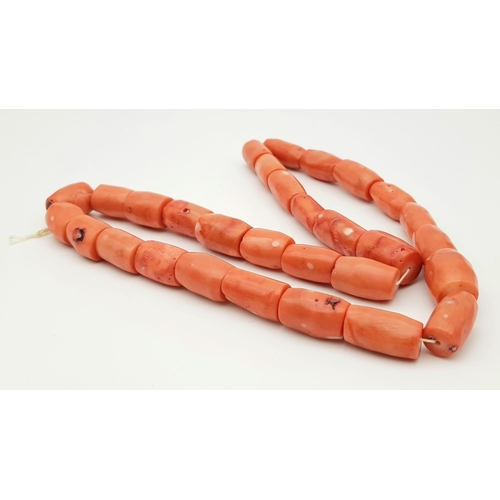 17 - A Vintage Natural Red Coral Barrel Beaded Necklace. A wonderful example piece of coral in its natura... 