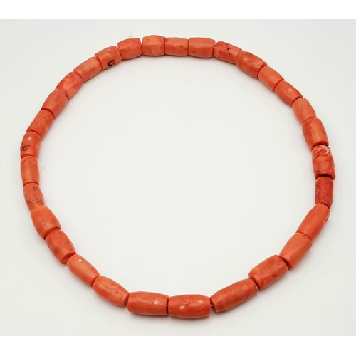 17 - A Vintage Natural Red Coral Barrel Beaded Necklace. A wonderful example piece of coral in its natura... 