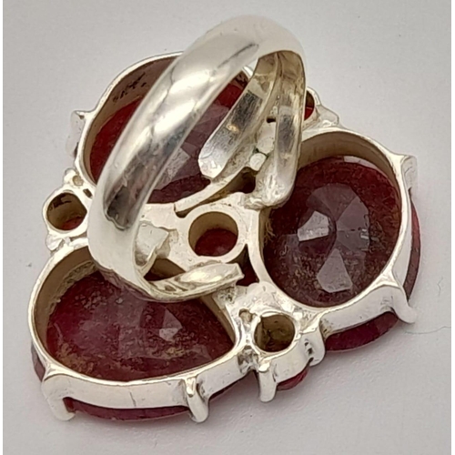 310 - A Ruby Gemstone Cocktail Ring in 925 Silver. Size O. 15g total weight.