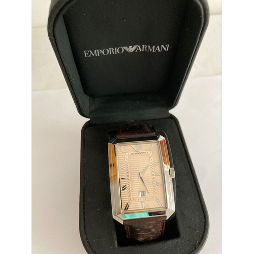 48 - Gentlemans Emporio ARMANI model AR 0456 wristwatch.Large square golden face with sweeping second han... 