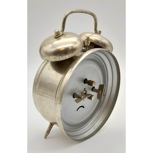 537 - A Vintage Backwards Double-Bell Alarm Clock. In working order.