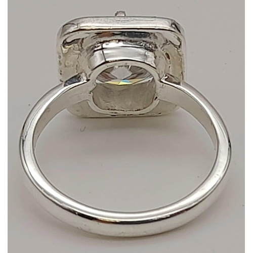 602 - A 3ct Cushion White Moissanite Ring with Black Enamel.
Size N.