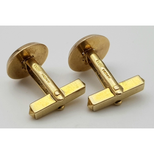 61 - A Pair of 9K Yellow Gold Enamelled Cufflinks. 10.1g total weight. Comes with a W.G.I. certificate.