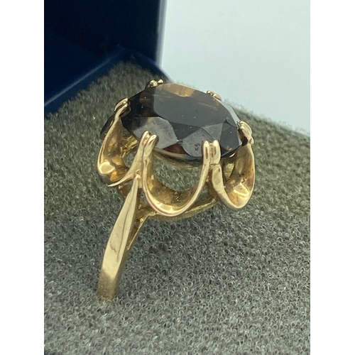 69 - 9 carat GOLD RING having 2 carat SMOKEY QUARTZ  Gemstone cushion cut and set to top. Full UK hallmar... 