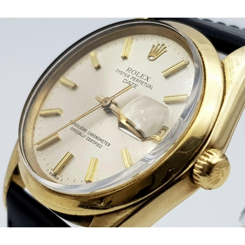 719 - A Rolex Oyster Perpetual Gold Cased Gents Watch. Black leather strap. 14K gold case - 35mm. White di... 