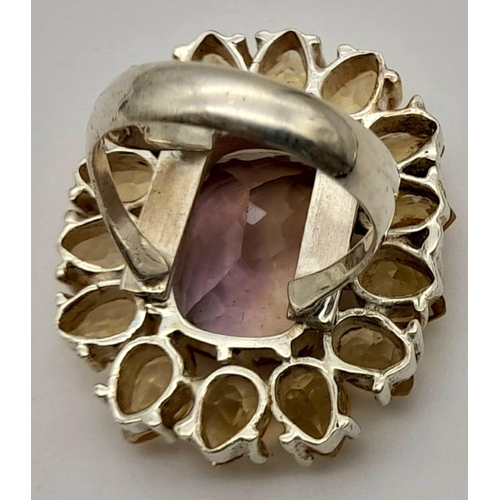 730 - An Ametrine and Citrine Gemstone Cocktail Ring in 925 Silver. Size P. 17.79g total weight.