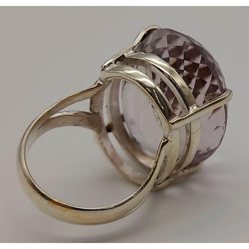 766 - An Amethyst Gemstone Ring in 925 Silver, Amethyst, approx 35ct. Size Q. 20.5g total weight.