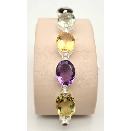 288 - A Citrine, Green Amethyst and Purple Amethyst Gemstone Bracelet with 925 Silver Clasp. 30g total wei... 