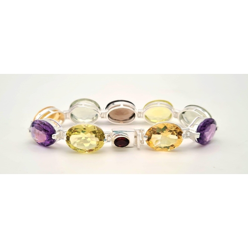 288 - A Citrine, Green Amethyst and Purple Amethyst Gemstone Bracelet with 925 Silver Clasp. 30g total wei... 