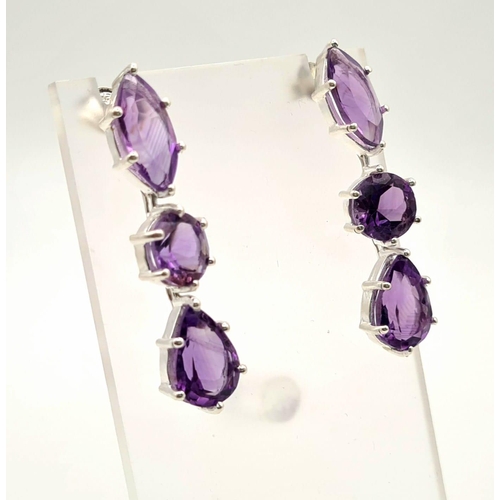 324 - A Pair of Amethyst Gemstone Earrings in 925 Silver. 13g total weight.