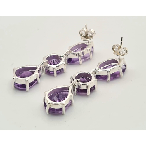 324 - A Pair of Amethyst Gemstone Earrings in 925 Silver. 13g total weight.