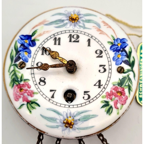 470 - An Antique Miniature Keinzle Porcelain Pendulum Wall Clock. 6cm diameter. In original box. In good c... 