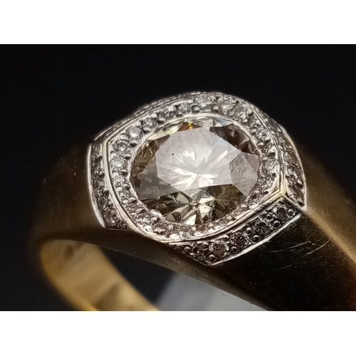 485 - An 18K Yellow Gold Champagne Diamond Gents Ring. 1.1ct. Size T. 10.1g total weight. Comes with a W.G... 