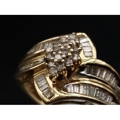 593 - A 10K Yellow Gold Diamond Double-Crossover Ring. Four baguette diamond bands meet in a central diamo... 