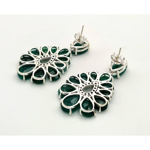 630 - A Pair of Emerald Gemstone Dangler Style Earrings in 925 Silver. 4cm