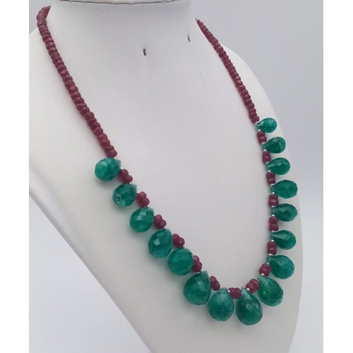 716 - 240ct Ruby Gemstone Single Strand Necklace with Emerald Drops. 44cm.