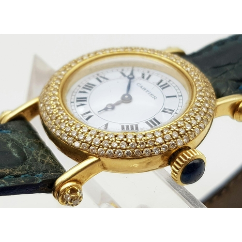 726 - A Cartier 18K Gold and Diamond Ladies Watch. Leather strap with gold clasp. Gold and diamond case - ... 