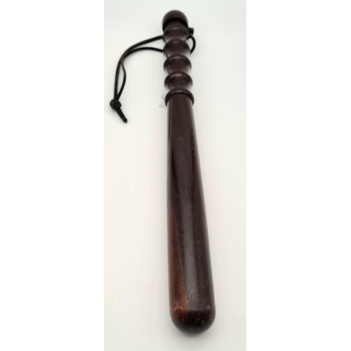 782 - A Victorian Wooden Police Truncheon. Good condition considering its age. 39cm.