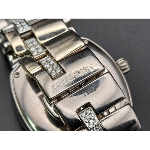 67 - A Chaumet 18K White Gold and Diamond Ladies Watch. 18K white gold with diamond strap and case - 30mm... 