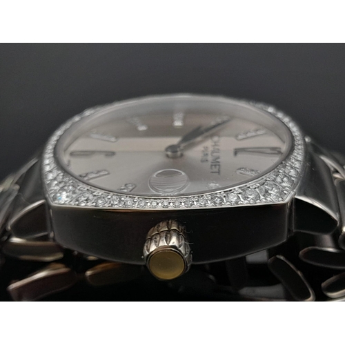 67 - A Chaumet 18K White Gold and Diamond Ladies Watch. 18K white gold with diamond strap and case - 30mm... 