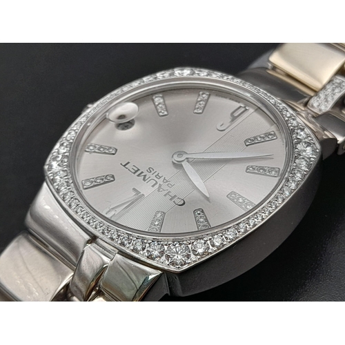 67 - A Chaumet 18K White Gold and Diamond Ladies Watch. 18K white gold with diamond strap and case - 30mm... 