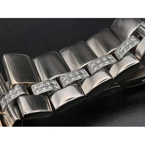 67 - A Chaumet 18K White Gold and Diamond Ladies Watch. 18K white gold with diamond strap and case - 30mm... 