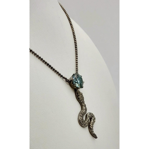 780 - A 5ct Blue Moissanite Snake Pendant in 925 Silver Black Gold Finish. 5cm and 50cm - chain.