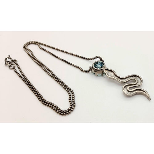 780 - A 5ct Blue Moissanite Snake Pendant in 925 Silver Black Gold Finish. 5cm and 50cm - chain.