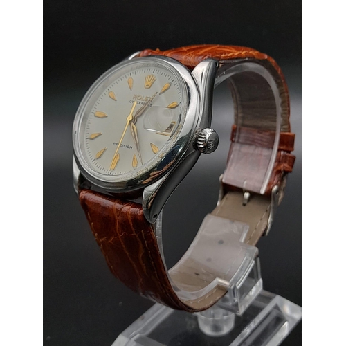 211 - A Rolex Oysterdate Precision Gents Watch. Brown leather strap. Stainless steel case - 34mm. Cream di... 