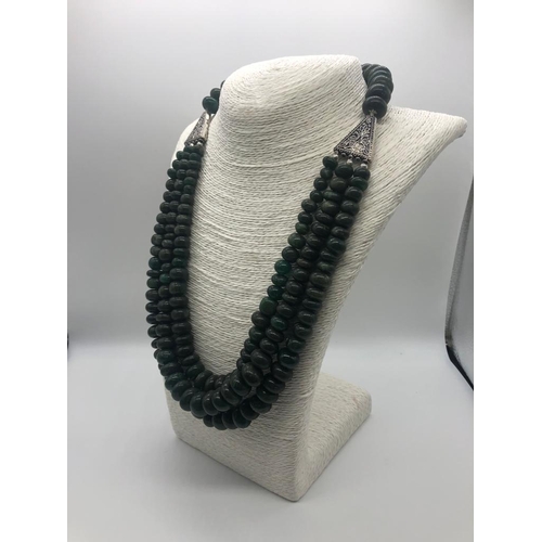 325 - A Three-Row Shades of Green Bloodstone Rondelle Statement Necklace. Graduated beads with pierced dec... 