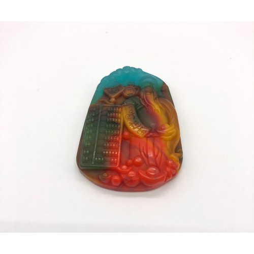 544 - A Multi-Coloured Lucky Wealth Abacus Jade Pendant.
5.5 x 4cm.