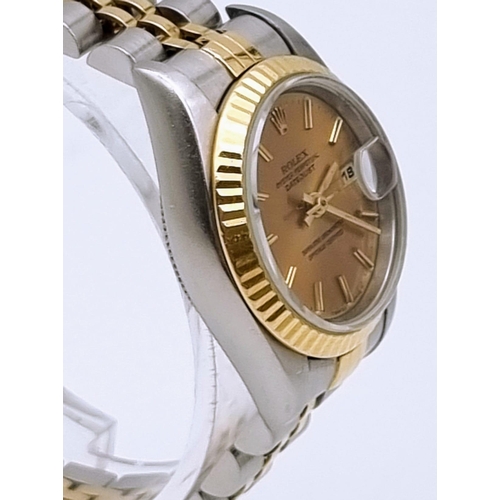 607 - A Rolex Oyster Perpetual Datejust Ladies Watch. Bi metal strap. Stainless steel and gold bezel case ... 