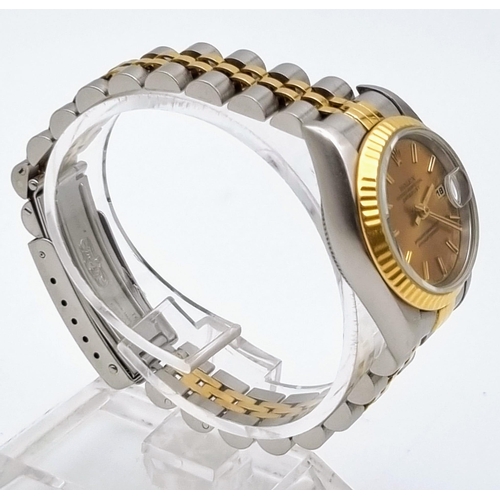 607 - A Rolex Oyster Perpetual Datejust Ladies Watch. Bi metal strap. Stainless steel and gold bezel case ... 