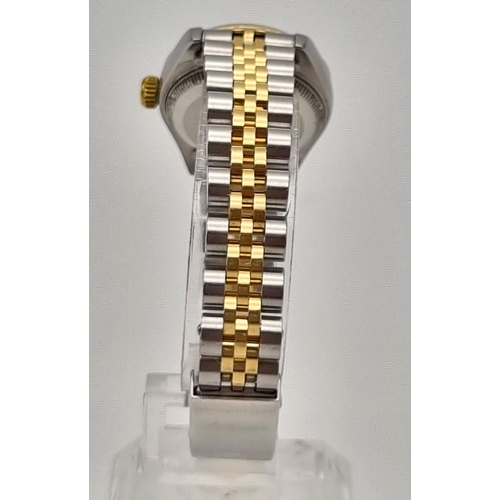 607 - A Rolex Oyster Perpetual Datejust Ladies Watch. Bi metal strap. Stainless steel and gold bezel case ... 