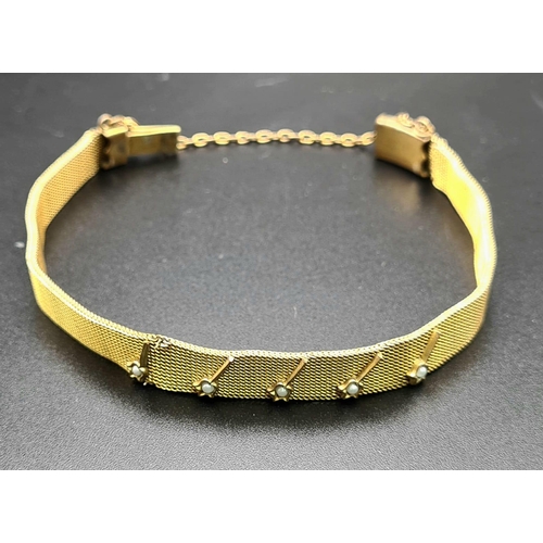 648 - An Antique Early Victorian Seed Pearl on Yellow Metal Mesh Bracelet. Five natural seed pearls in a f... 