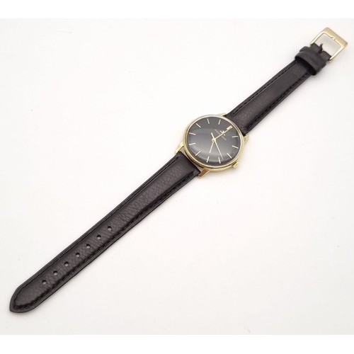 692 - A Vintage Jaeger Le Coultre 18K Gold Gents Watch. Black leather strap. Gold case - 35mm. Black dial ... 