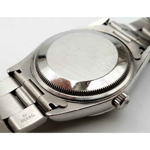 706 - A Rolex Oyster Perpetual Diamond Gents Watch. Stainless steel strap and case - 35mm. Silver tone dia... 