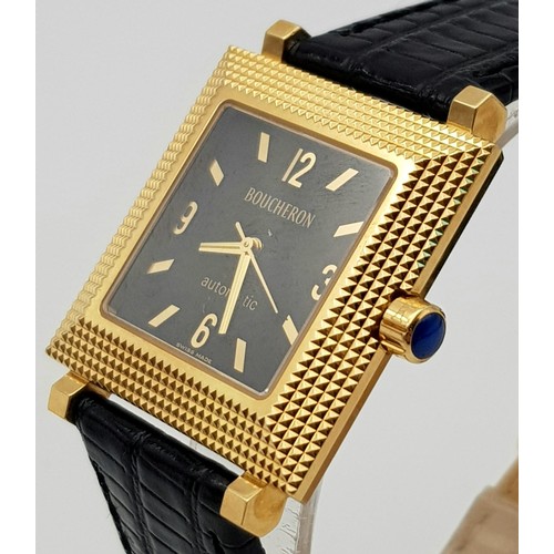 358 - A Boucheron 18K Gold Gents Watch. Black leather strap. 18k gold square case - 30 x 30mm. Black dial.... 