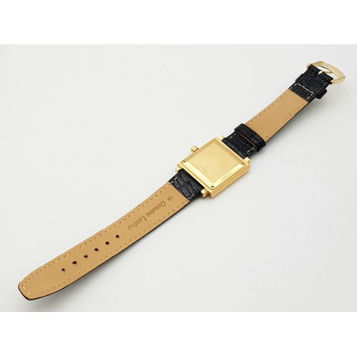 358 - A Boucheron 18K Gold Gents Watch. Black leather strap. 18k gold square case - 30 x 30mm. Black dial.... 