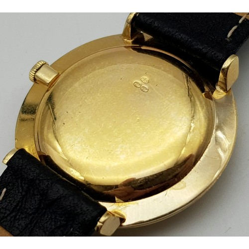 628 - A Vintage 18K Gold Vacheron and Constantin Gents Watch. Black leather strap. 18k gold case - 35mm. W... 