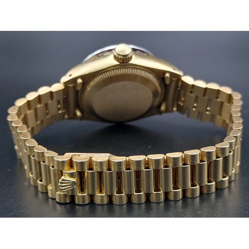 623 - An 18K Gold Rolex Diamond Oyster Perpetual Datejust Ladies Watch. 18k gold strap and case - 26mm. Di... 