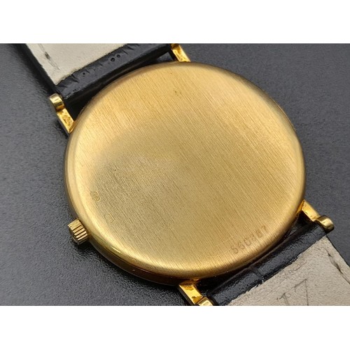 705 - A Vacheron Constantin 18K Gold Quartz Gents Watch. Black leather strap. 18k gold case - 30mm. Gold t... 