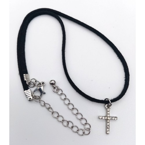 499 - A clear stone necklace and bracelet set and a similar cross on a material necklace . Necklace length... 