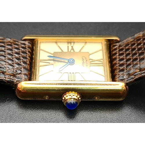 727 - A Must de Cartier Ladies Tank Watch. Alligator strap. 925 gilded case - 27 x 20mm. Quartz movement.